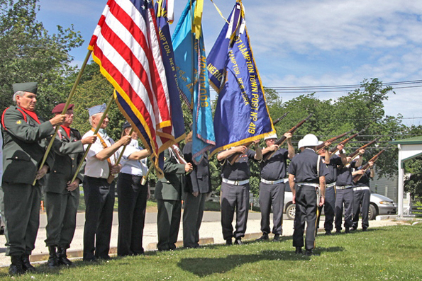 Sergeant Tom Collins was honored with a 21-gun salute at Ashawagh Hall on Sunday.