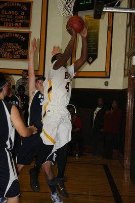 Josh Lamison goes up for two of his 23 points in the win over Ross. CAILIN RILEY
