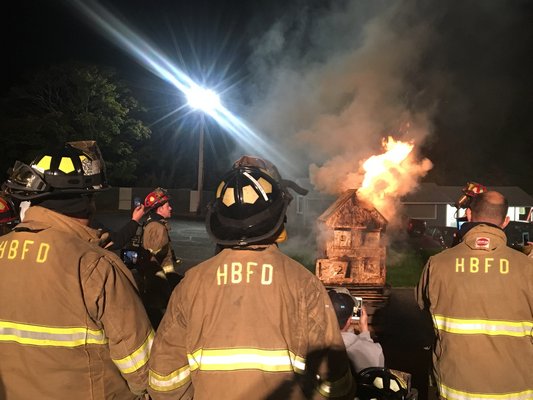 Hampton Bays firefighters set the Palmer Dollhouse on fire. COURTESY HAMPTON BAYS FIRE DEPARTMENT.