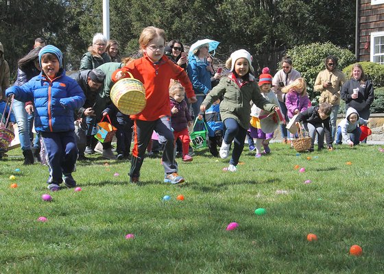 Kids race to gather eggs.