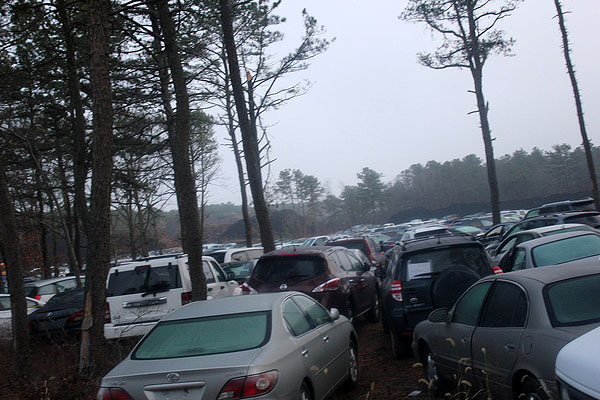 Cars damaged during Superstorm Sandy being stored at a lot off Speonk-Riverhead Road in Speonk on Tuesday. CAROL MORAN