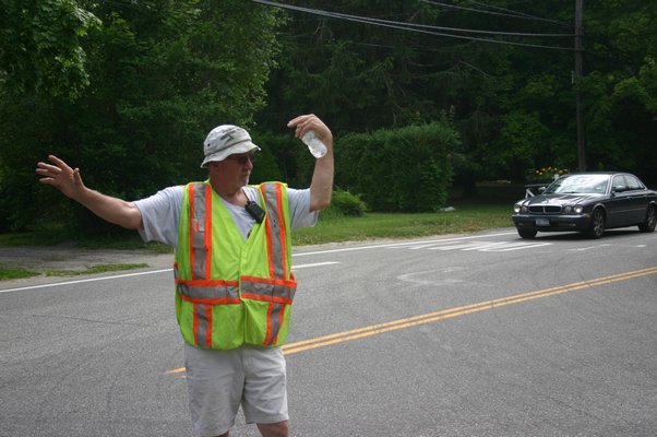  fire and emergency medical services agenecies responded to a mulch fire on June 26 off of Speon-Riverhead Road in Speonk. The road was closed for about three hours while responders surpressed the flames. KYLE CAMPBELL