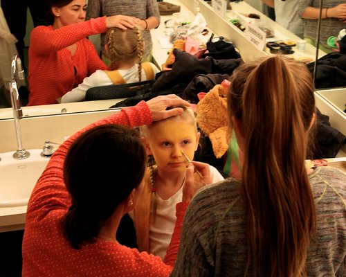 Students get their makeup done.