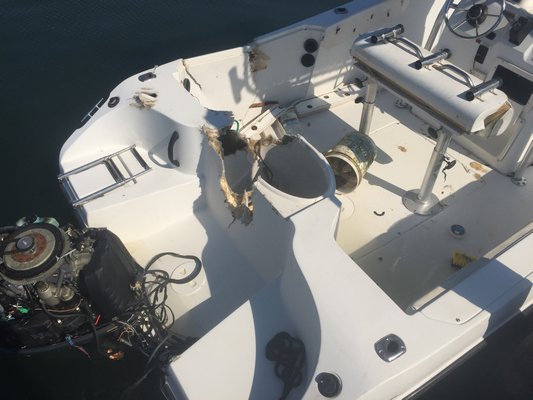 The Sea Swirl Striper suffered significant fiberglass damage. MICHAEL WRIGHT