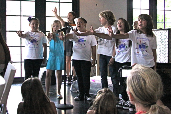 The East Hampton YMCA Glee Club performed at Miss Lucy's East Hampton YMCA singers concert at M&E restaurant on Tuesday.