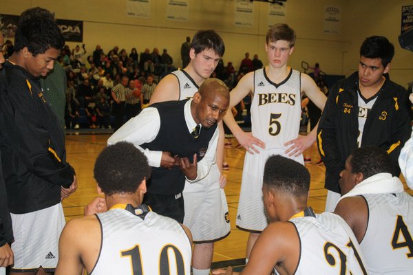 Carl Johnson speaks to his team during a timeout. CAILIN RILEY