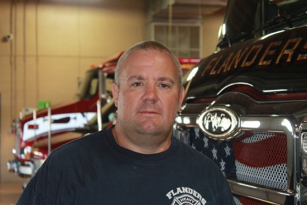 Flanders Fire Department Chief Joseph Pettit inside the Flanders Firehouse. KYLE CAMPBELL