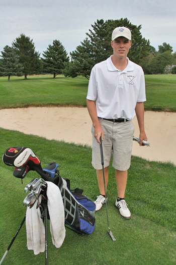 John Nolan prepares to putt.