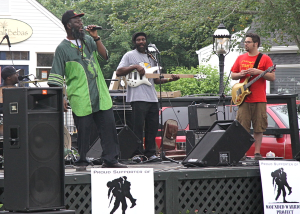 The mood was festive as Winston Irie and his reggae band performed on the green at Amagansett Square on Sunday afternoon in a concert benefitting the Wounded Warrior Project. Kyril Bromley