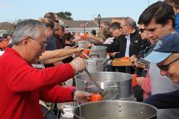 Hundreds lined up for their cup of red or white clam chowder at the Montak Fall Festival.