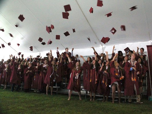 Maroon caps and gowns were the order of the day as East Hampton High School held its graduation ceremony on Friday. KRYIL BROMLEY