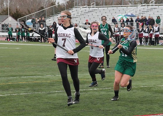Cassidy Walsh had five goals in East Hampton's 15-1 rout of Mercy on Friday. KYRIL BROMLEY