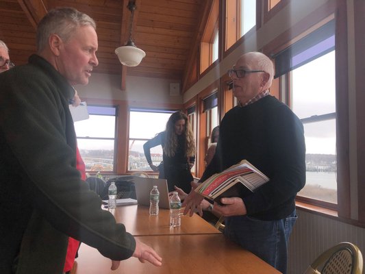 British fishermen Merlin Jackson and Colin Warwick told commercial fishermen from the South Fork that they must remain organized and keep pressing for more input on where and how wind farms are built in the Atlantic.      MICHAEL WRIGHT