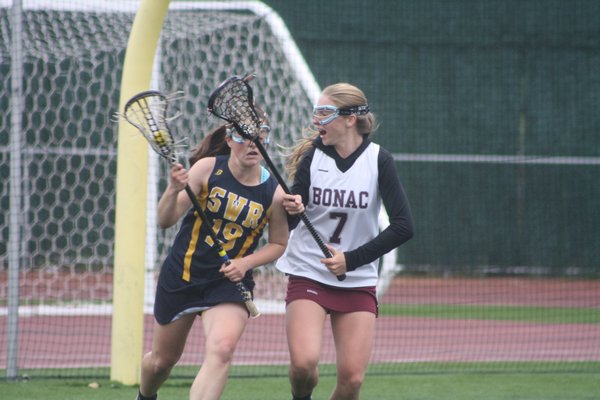 Cassidy Walsh (shown in a win over Shoreham) had a career-high 10 goals in a double overtime loss to Bellport last week. CAILIN RILEY