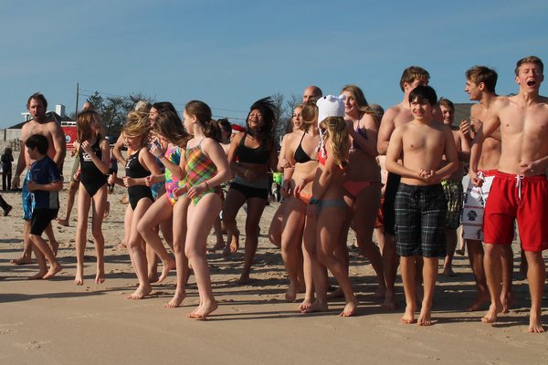 The East Hampton Polar Bear Plunge was held on Wednesday at Main Beach to raise funds for the East Hampton Food Pantry. KYRIL BROMLEY