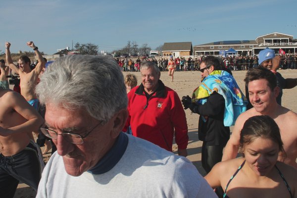 The East Hampton Polar Bear Plunge was held on Wednesday at Main Beach to raise funds for the East Hampton Food Pantry. KYRIL BROMLEY