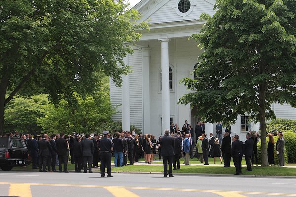Hundreds of people attended funeral services for Ben and Bonnie Krupinski and their grandson William Maerov on Friday at the First Presbyterian Church of East Hampton.           KYRIL BROMLEY