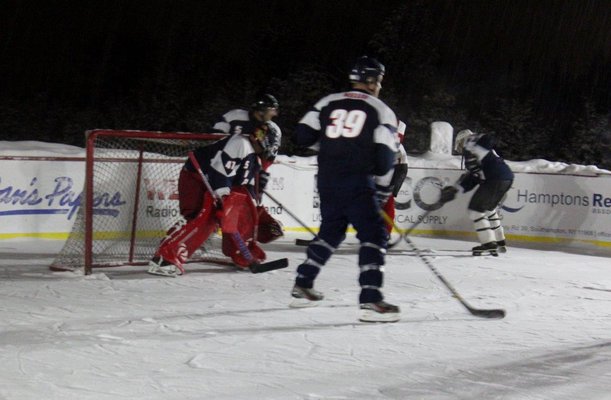 The Southampton Village Police Department and the Southampton Fire Department participated in an exhibition hockey game to raise money for their chosen charity. JESSICA BOBINSKI