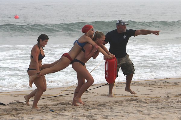 Lifeguards compete in the landline rescue. KYRIL BROMLEY