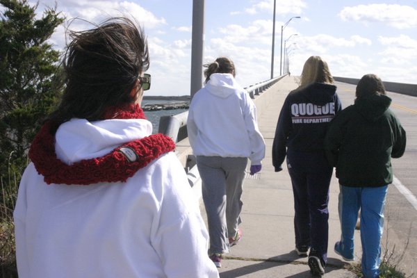  of East Quogue walks across the Ponquogue Bridge in Hampton Bays on Saturday. Anna walks several times a week