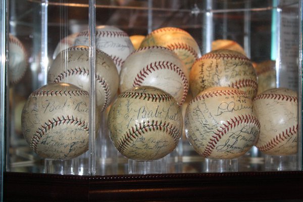 Rick Friedman has created his own mini baseball hall of fame in the basement of his Southampton home. CAILIN RILEY