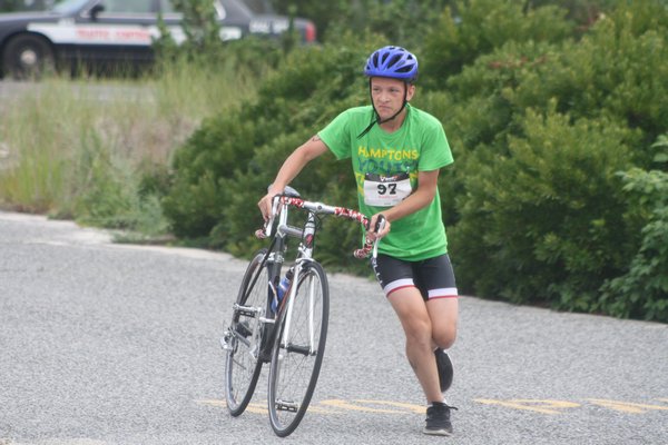 Tyler Pawlowski of Nassau County won the Hamptons Youth Triathlon in what was his first-ever attempt at a triathlon. CAILIN RILEY