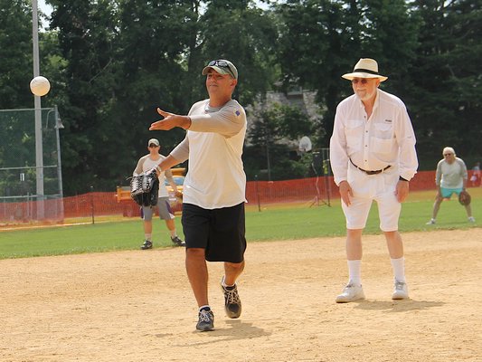 John Franco on the mound for the Artitists with umpire Dan Rattiner at the 68th annual Artists & Writers Softball Game on Saturday. KYRIL BROMLEY