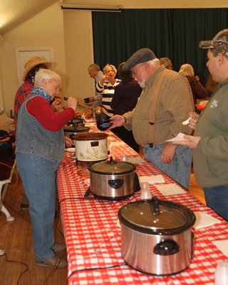Serving up chili at the cook-off.