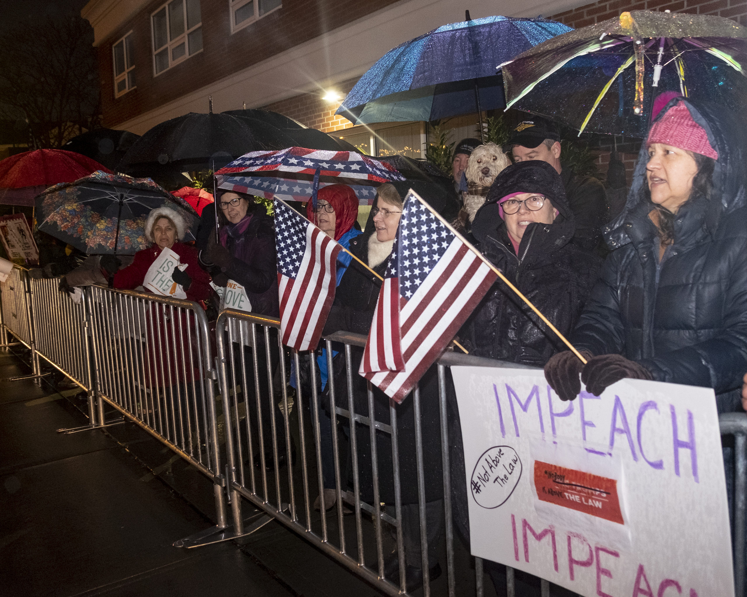 Protesters gathered outside U.S. Representative Lee Zeldin's offices earlier this week to demand he vote in favor of impeachment.
