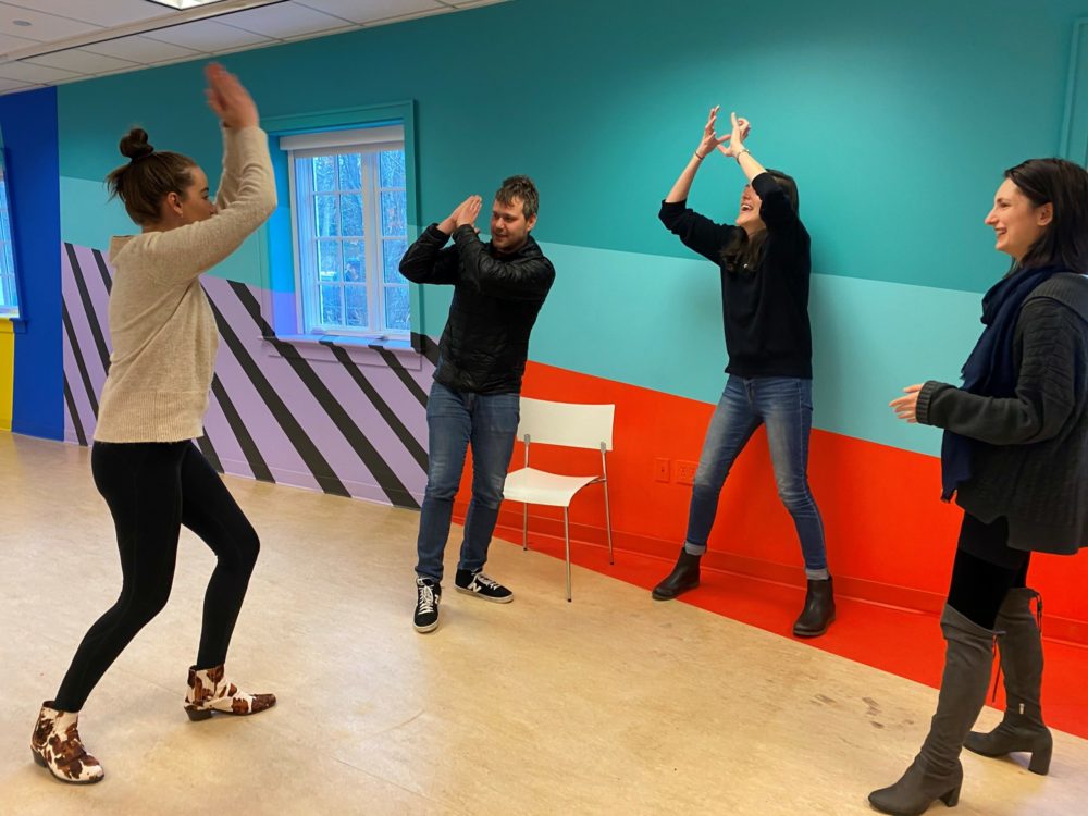 The staff of Guild Hall  warming up for Tina Jones’s upcoming improv class.