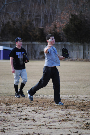 Justin Carbone works on fielding in practice.
