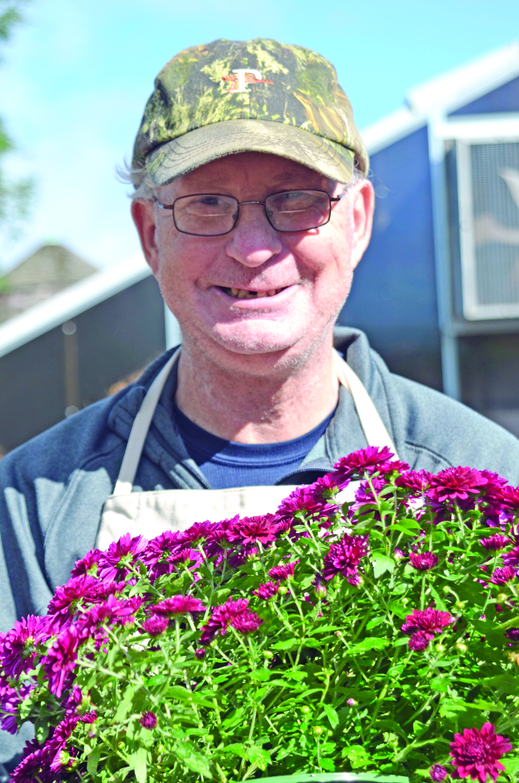 An employee at Smile Farms in Moriches. KIM COVELL