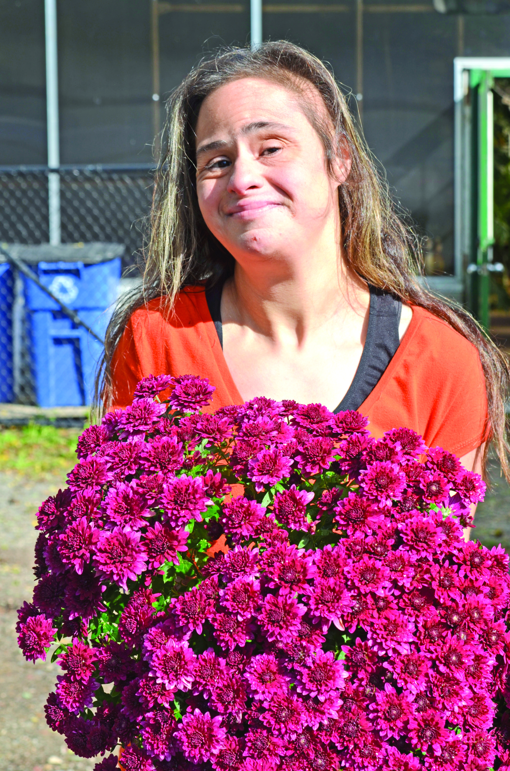 An employee at Smile Farms in Moriches. KIM COVELL
