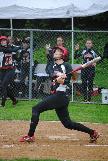 Pierson's Sami James slides safely in her team's 4-3 win at Port Jefferson on Monday.