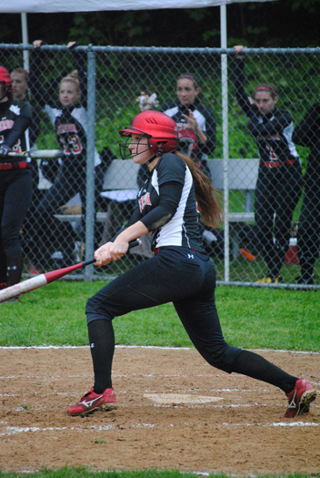 Sami James slides into home.