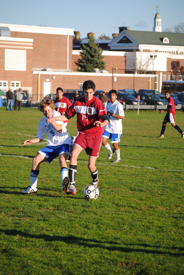 Mariner Jefte Ruiz tries to move the ball around a Mattituck defender.