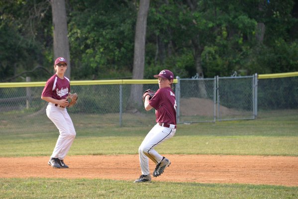 Ethan Walker makes a throw for the Southampton All-Stars in their first game against North Shore. MICHELLE MALONE