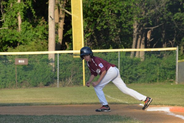 Andrew Venesina takes a lead off first. MICHELLE MALONE