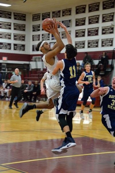 Southampton's Andre Franklin goes up against a Bayport/Blue Point defender on Tuesday. MICHELLE MALONE
