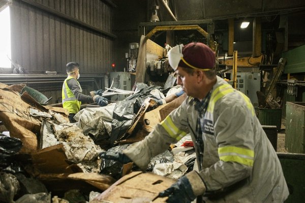 Material solid waste (MSW) and construction debris are processed on two separate belts at Paumanok Environmental in Yaphank. Much of the East End's garbage ends up in this facility. JOSEPH P. LOUCHHEIM