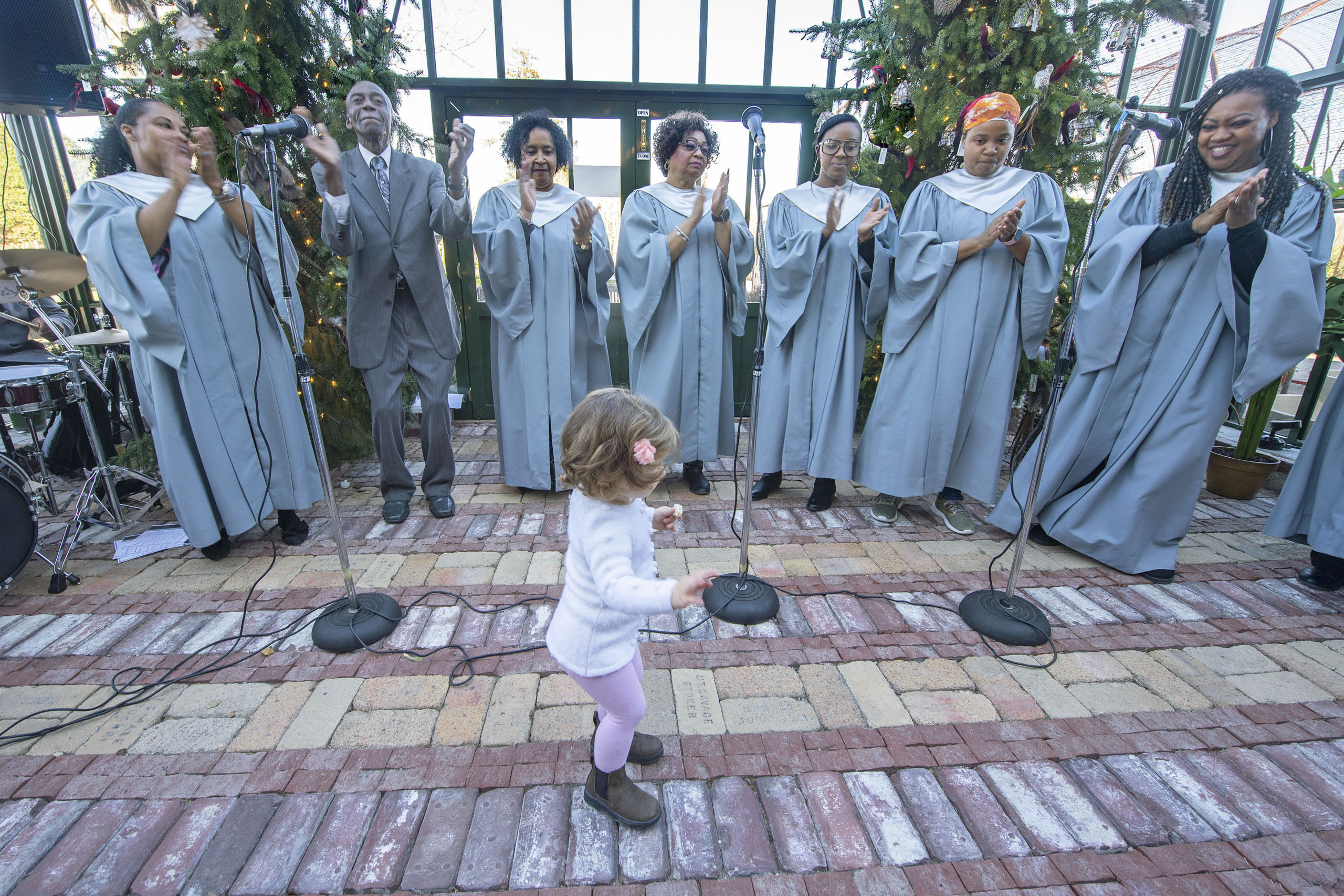 Eighteen-month-old Taylor Rader rocks out as the Genesis Ensemble of the First Baptist Church of Bridgehampton performed a Gospel 
