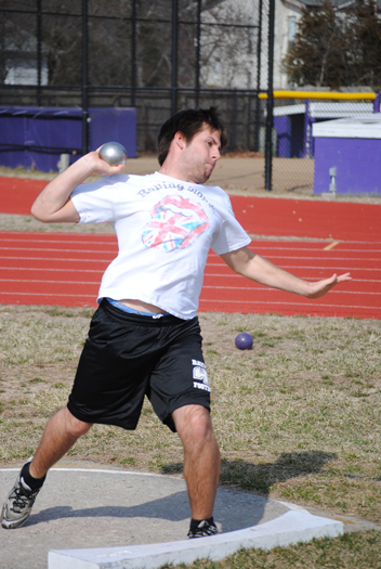 Chaz Jakubauskas practices the discus throw.

