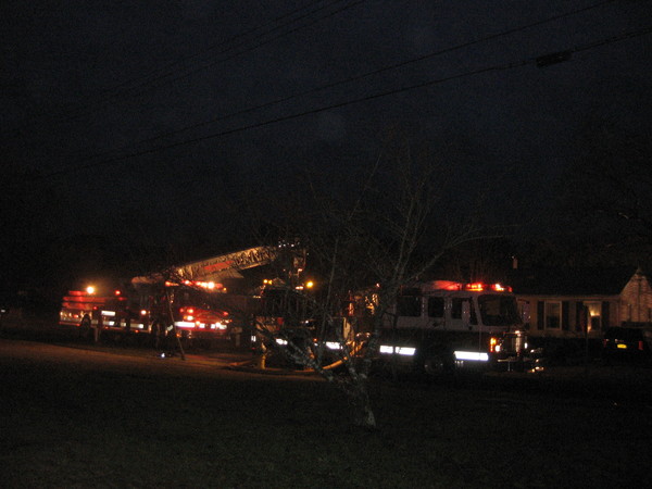 Westhampton Beach Fire Department volunteers rushed to the scene of a fire on Cook Street in Westhampton on Tuesday. LISA FINN