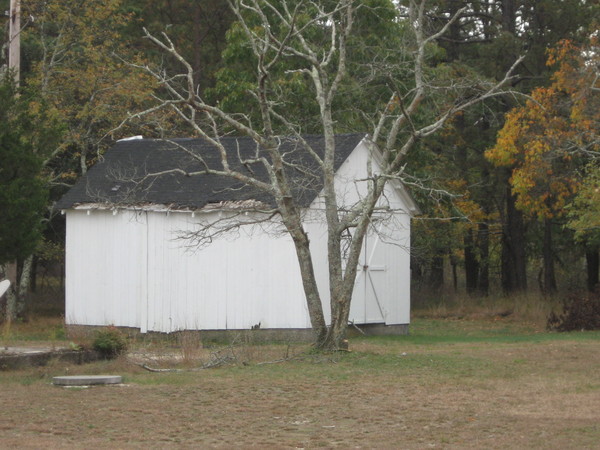 Outbuildings on the property of the Black Duck Lodge have collapsed from years of neglect.