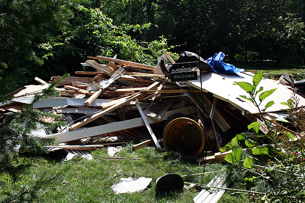 A pile of debris in the front yard of East Moriches resident John Sarli's house