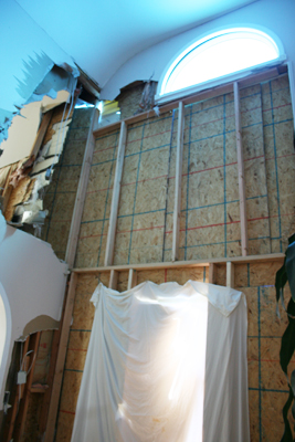 Damage to Mr. Sarli's house after a car crashed into the second floor early Saturday.