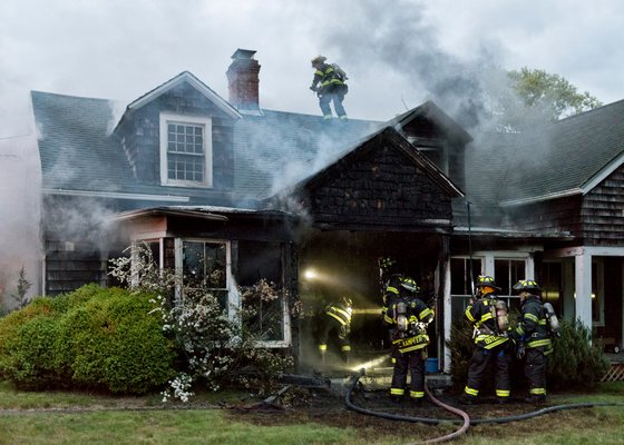  Quogue and Eastport put out a house fire at 33 Quantuck Bay Lane on Quiogue on Saturday night. COURTESY WESTHAMPTON BEACH FIRE DEPARTMENT