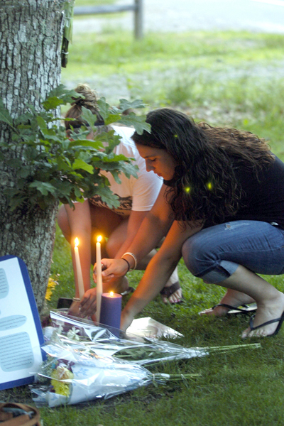 Students at the memorial for Cameron Nicholls at the East Quogue Village Green last year.