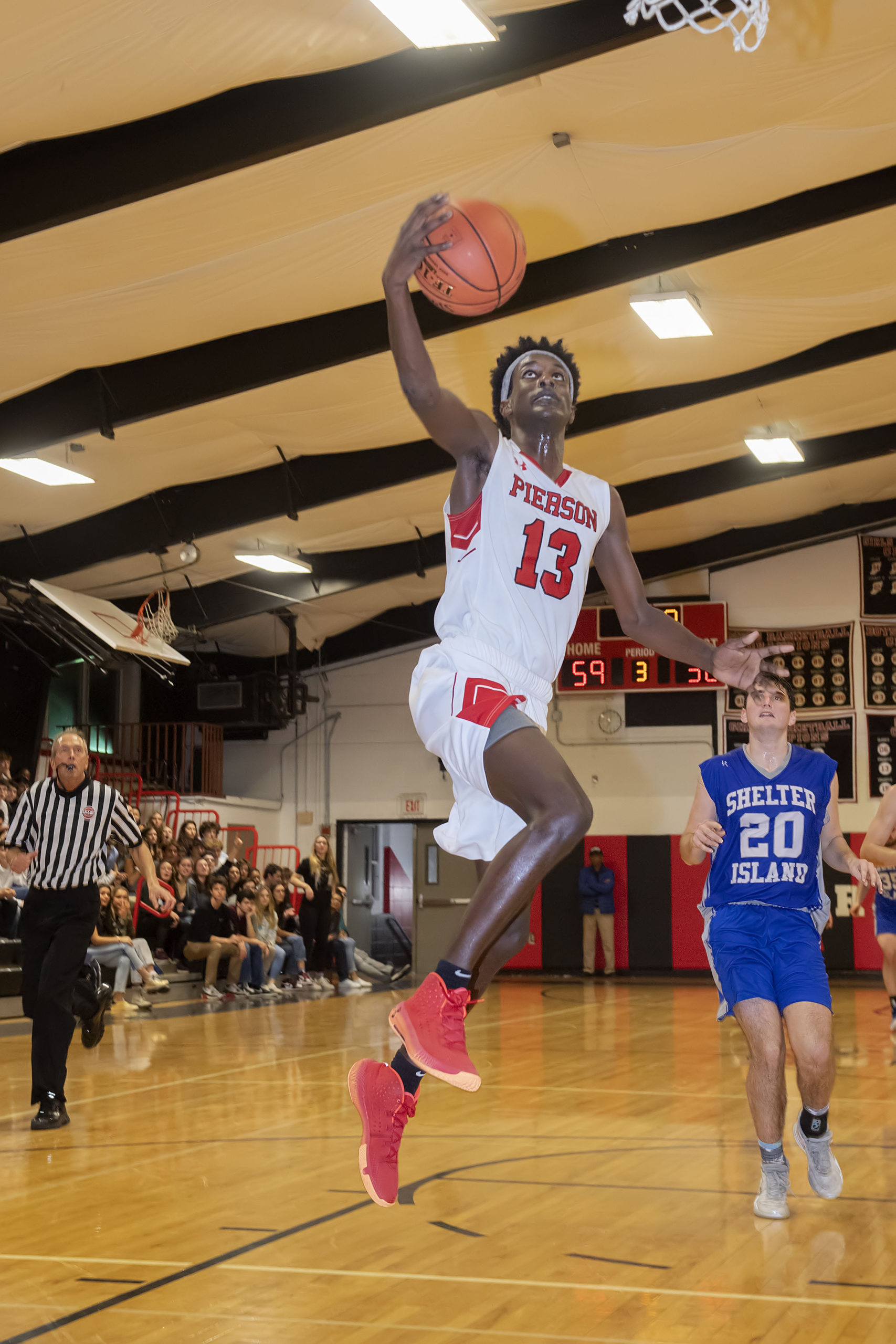 Pierson's Haptamu Coulter goes up for a layup.