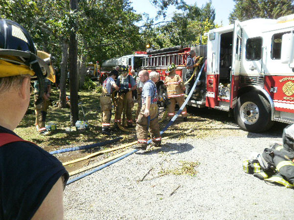 Members of The Westhampton Beach Fire Department  after  Hurricane Irene. COURTESY WHB FIRE DEPARTMENT